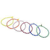 Dana Levy set of colourful striped beaded bracelets on a white background.