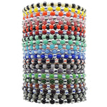 Dana Levy stack of colourful and striped glass beaded bracelets on a white background.