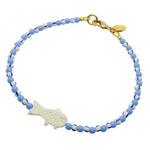 Dana Levy white bone fish charm striped glass bead mix anklet with cornflower blue glass beads and white/blue striped glass beads and a gold plated clasp on a white background.