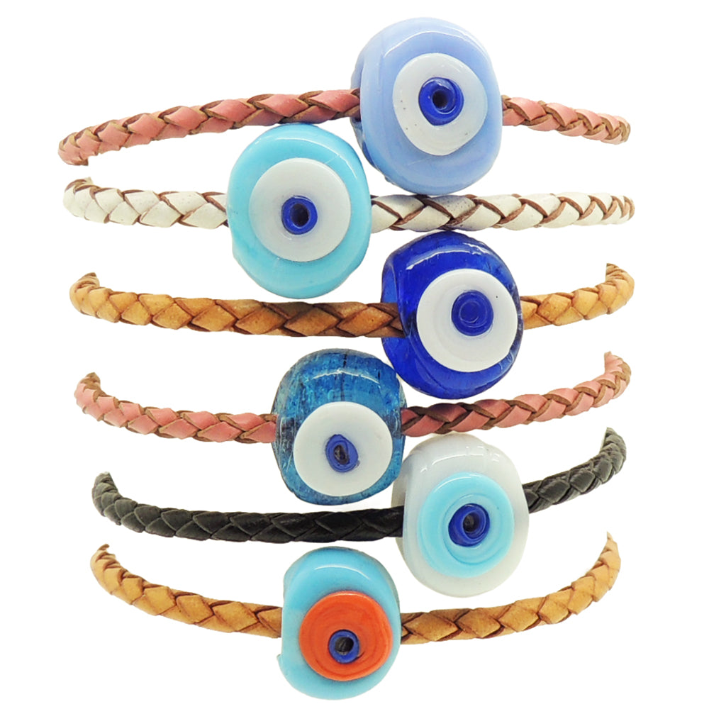 A stack of Dana Levy men's braided leather bracelets with  glass evil eye charms in a variety of colours, shown on a plain white background.