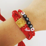Dana Levy Red Alphabet Charm Bandana Braid Bracelet on Wrist with Amor Bracelet