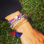 Dana Levy Cowry Shell Charm Friendship Bracelet - Bracelet Mix on Wrist on Grass