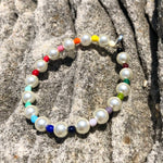 Dana Levy Faux Pearl Rainbow Glass Bead Bracelet - Aus Rocks Background