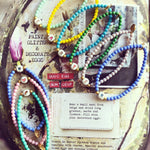 Dana Levy Limited Edition Enamel Initial Charm Glass Bead Bracelet Easter Display