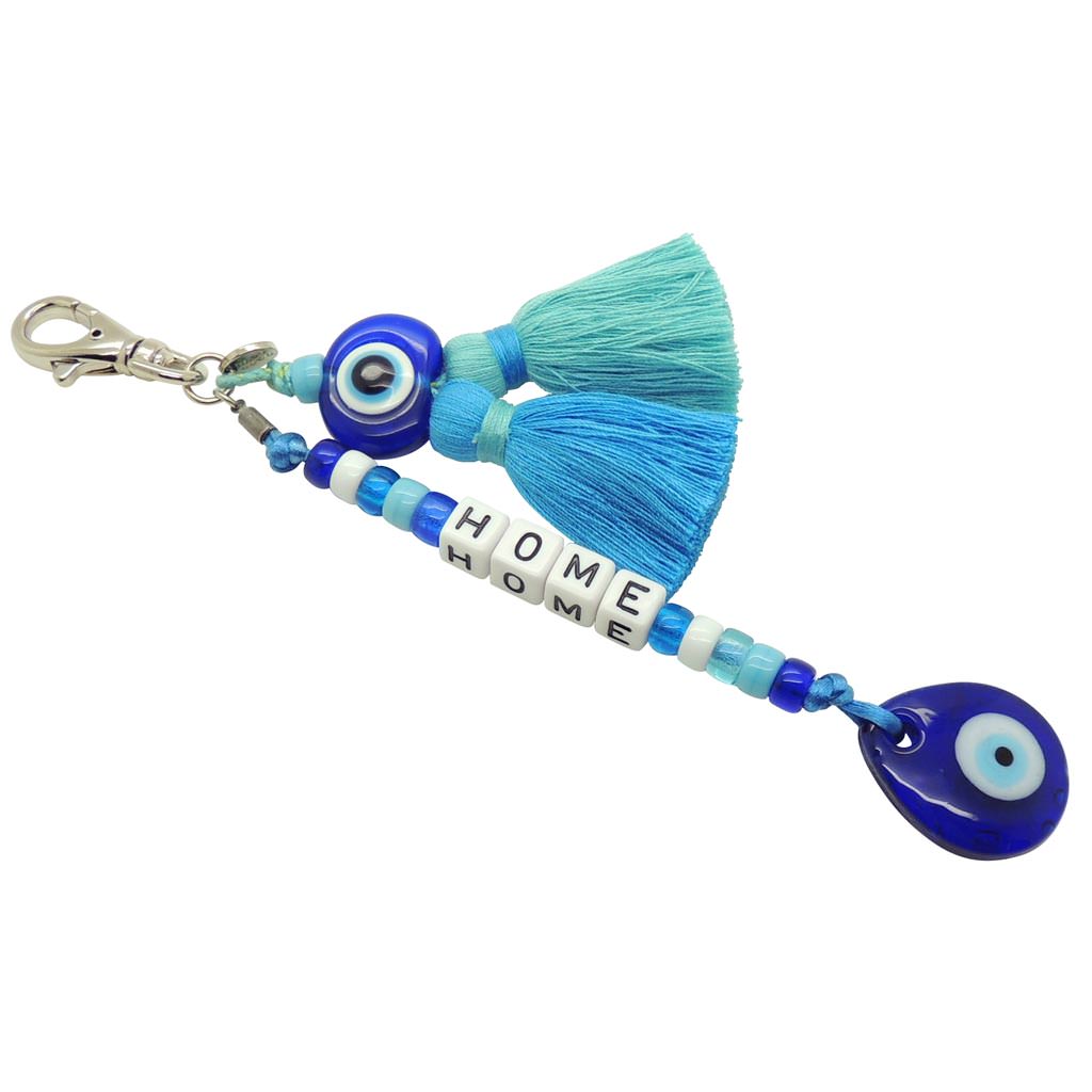 Dana Levy Personalised Alphabet Cube Evil Eye Charm Tassel Keyring with Home Written with Alphabet Cubes and Light Turquoise and Blue Double Tassel and Royal Blue Evil Eye Amulets.