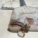 Dana Levy Seashell Charm Metallic Double Leather Cord Bracelet - Metallic Gold on Beach