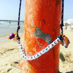 Dana Levy Treasure Island Alphabet Charm Cord Necklace - Resting Beach Face at the Beach