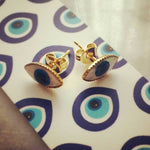 Dana Levy Limited Edition Mother of Pearl Evil Eye Stud Earrings - on Evil Eye background