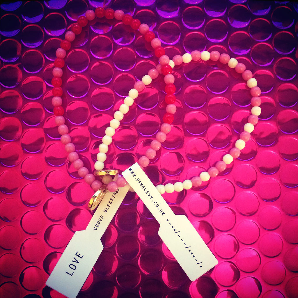 Light pink deals lokai bracelet meaning