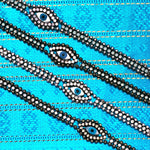 Dana Levy Mother of Pearl Evil Eye Charm Swarovski Crystal Ball Chain Bracelet - Turquoise Silk Damask Background