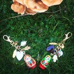 Dana Levy Matryoshka Russian Doll Bag Charms - on grass Instagram 
