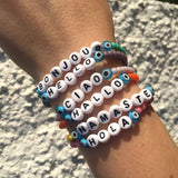 Dana Levy Hello English Greeting Glass Bead Bracelet - on wrist