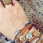 Dana Levy Ancient Roman Coin Charm Faceted Glass Bead Bracelet - On Wrist Instagram