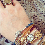 Dana Levy Ancient Roman Coin Charm Faceted Glass Bead Bracelet - On Wrist Instagram