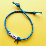 Dana Levy Personalised Name Alphabet Charm Cord Bracelet - Name on Turquoise Cord with Horseshoe