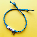 Dana Levy Personalised Name Alphabet Charm Cord Bracelet - Name on Turquoise Cord with Horseshoe