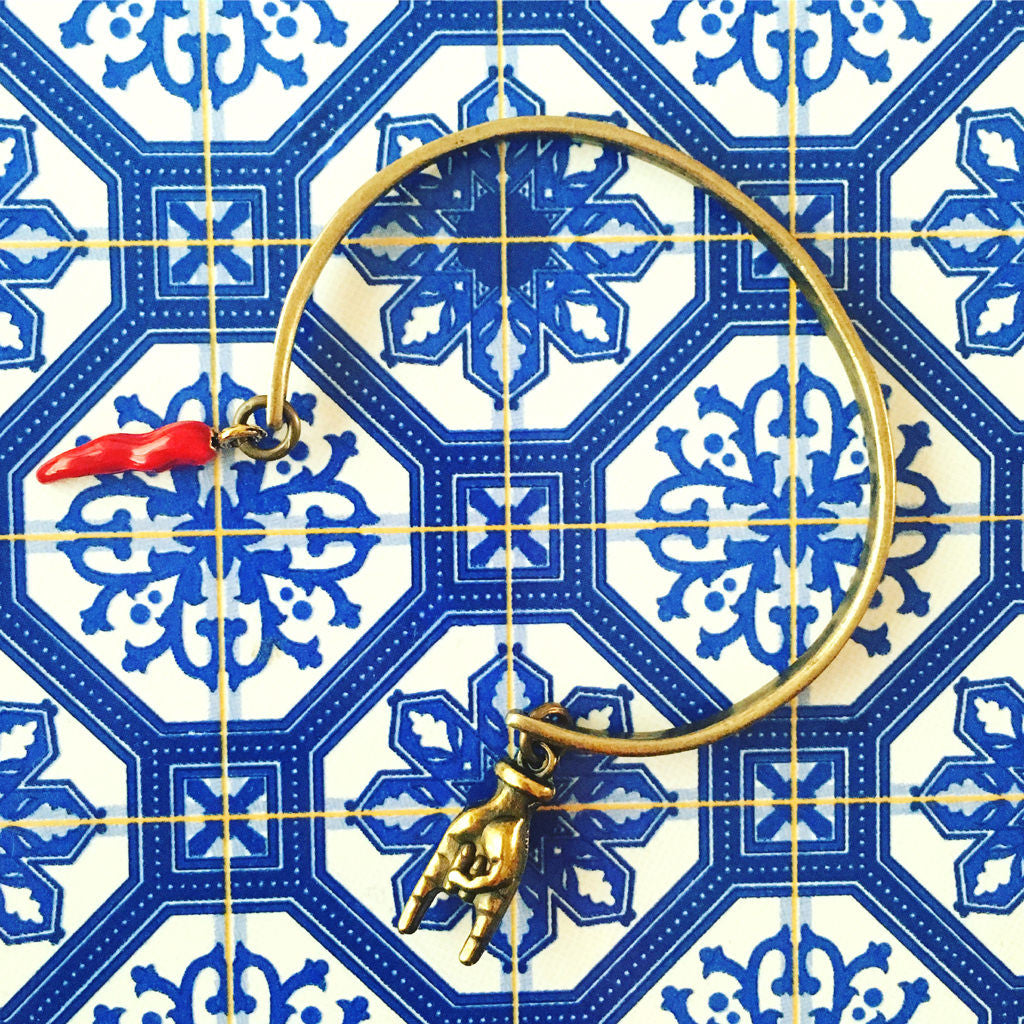 Dana Levy Mano Hand Cornicello Charm Cuff - on Portuguese Tile Background