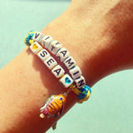 Dana Levy Treasure Island Alphabet Charm Cord Bracelet - Vitamin Sea on Wrist