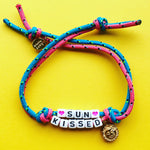 Dana Levy Treasure Island Alphabet Charm Cord Bracelet - Sun Kissed Yellow Background 