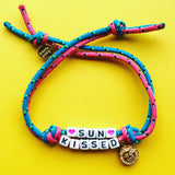 Dana Levy Treasure Island Alphabet Charm Cord Bracelet - Sun Kissed Yellow Background 