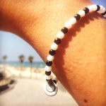 Dana Levy Love Morse Code Blessing Glass Bead Bracelet - on Wrist in Sun