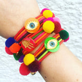 Dana Levy Neon Evil Eye Lucky Charm Pompom Bracelet - Group Stack on Wrist 