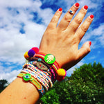Dana Levy Lima Pompom Beaded Wrap Bracelet - Mix of Friendship Bracelets Sky Background 