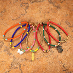 Dana Levy Mother of Pearl Turtle Charm Glass Bead Bracelet - Group Mix Flatlay