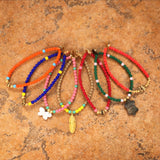Dana Levy Mother of Pearl Turtle Charm Glass Bead Bracelet - Group Mix Flatlay