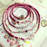Dana Levy Mother of Pearl Symboleyes Glass Bead Necklace - Pink Love Flatlay