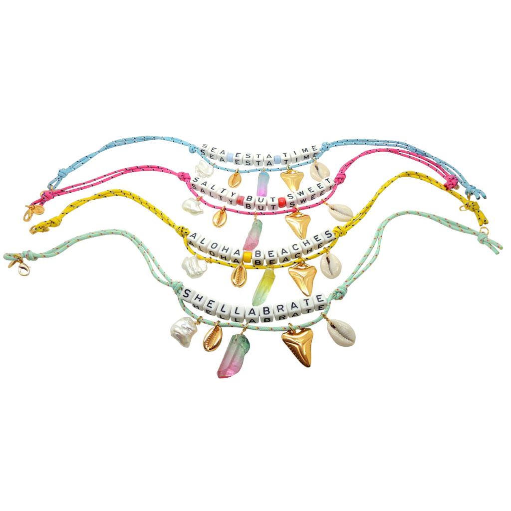 Dana Levy Personalised Maxi Alphabet Cube Beach Treasures Nautical Cord Necklace - Group Flatlay Light Blue Pink Yellow Mint
