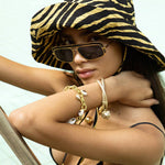Dana Levy Midas Cowrie Shell Charm Metallic Leather Cord Bracelet - Gold Bracelet on Model
