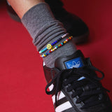 Dana Levy Smiley Charm Rainbow Glass Bead Anklet - Detail Duo with Multicolour Evil Eye Balagan Anklet ThreadsGen