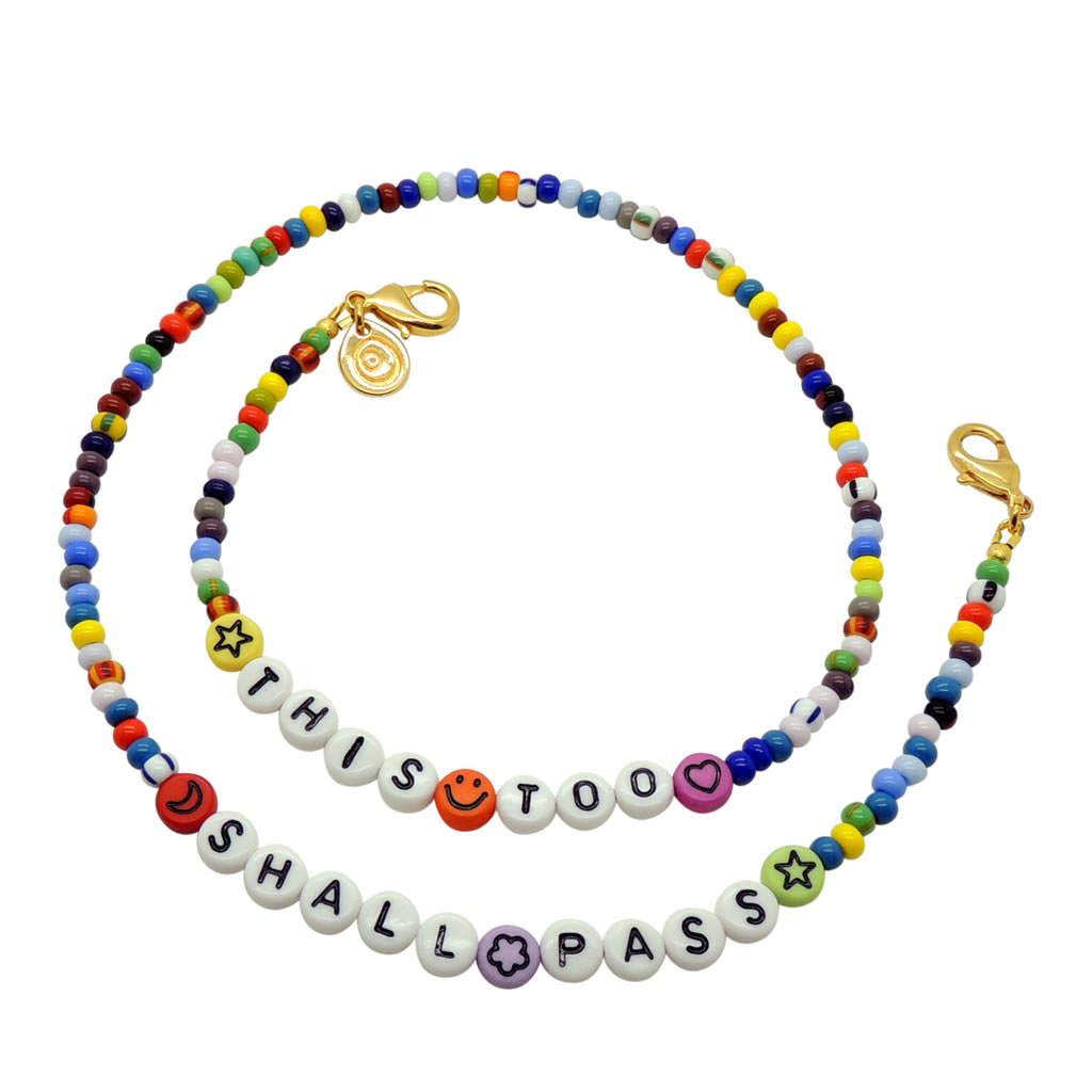 Dana Levy Personalised Alphabet Lucky Charm Balagan Glass Bead Face Covering Chain - This Too Shall Pass - White Beads Black Text