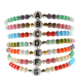 Dana Levy Initial Alphabet Letter Charm Glass Bead Bracelet - White A to G Stack