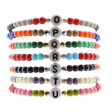 Dana Levy Initial Alphabet Letter Charm Glass Bead Bracelet - White O to U Stack