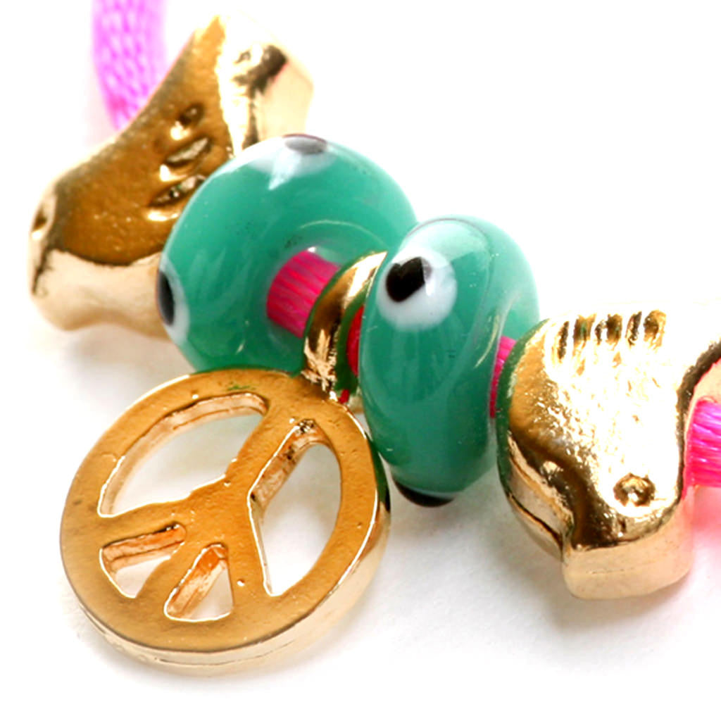 Dana Levy Peace Symbol and Dove Charm Satin Cord Bracelet - Detail of Gold on Neon Pink