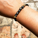 Dana Levy Get Lucky Alphabet Glass Bead Bracelet - on Wrist in Old City Jerusalem