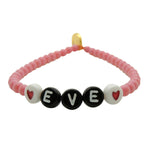 Dana Levy personalised name glass bead bracelet with Eve in black acrylic letters, red heart beads and pink glass beads on a white background. 