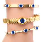 Dana Levy Mother of Pearl Evil Eye Trio Bangles and Cuffs on Wrist